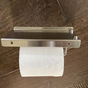 Toilet paper/phone holder